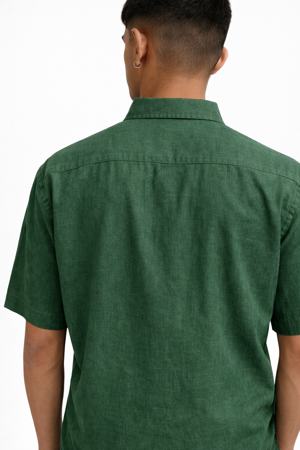 Close-up of alpine green linen fabric showing natural texture and weave