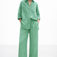 Aura Green Linen Set for women featuring a relaxed linen shirt and wide-leg pants in a soft green hue