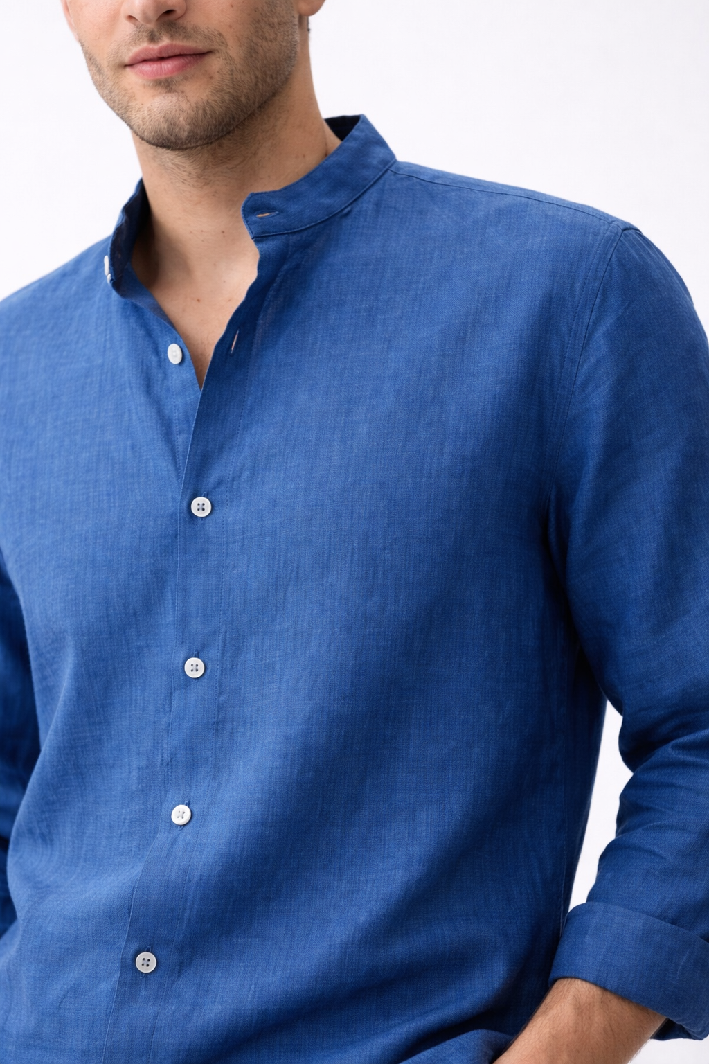 Close-up of Blue Dune pure linen shirt fabric showing natural linen texture