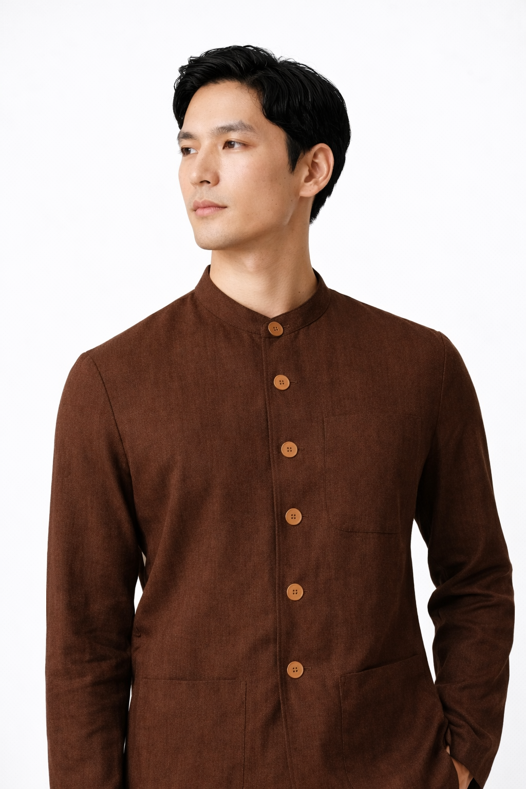 Close-up of pure linen fabric texture in chocolate brown jacket