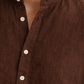 Close-up of pure linen fabric texture in chocolate brown kurta