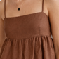 Close-up of linen fabric texture on Cocoa Bloom top