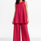 Evara linen set for women featuring a sleeveless pink linen tunic and wide-leg pants, front view
