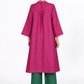 Back view of Gulbahar Rani pink linen tunic with bottle green linen pants