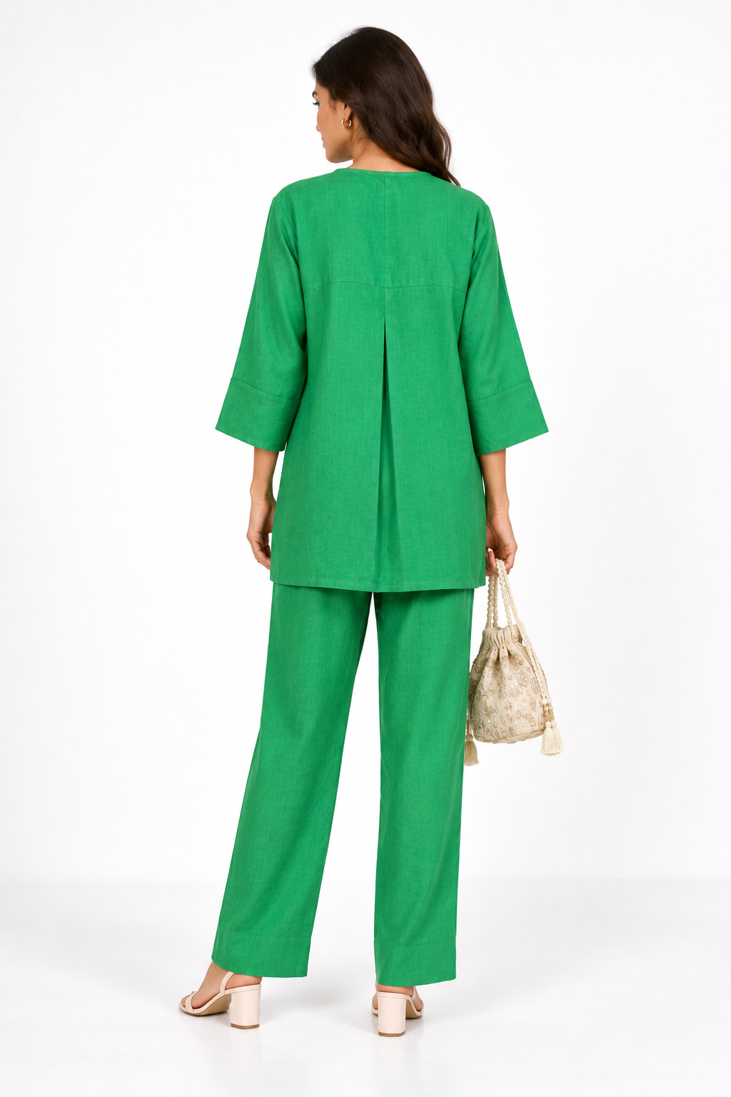 Harit green linen kurta set for women back view with pleated detail