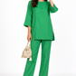 Harit green linen kurta set for women styled with festive potli bag