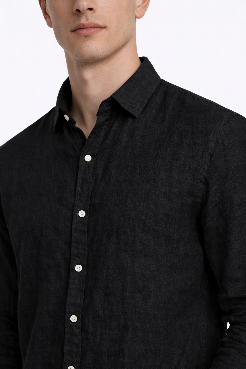 Close-up of pure linen fabric texture on black men’s linen shirt