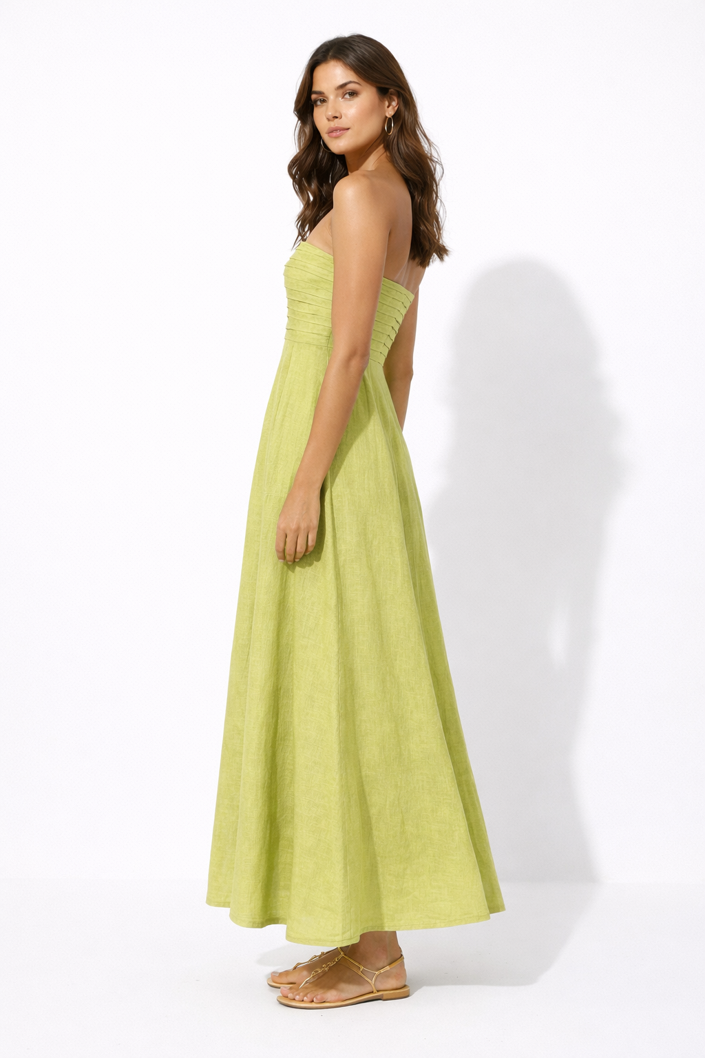 Side view of Lime Aura Linen Dress showing invisible side zip and soft linen drape