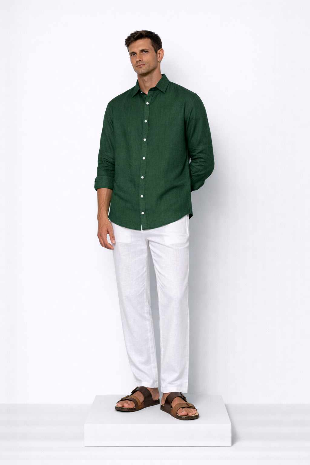 Model wearing alpine green linen shirt for men from LININ