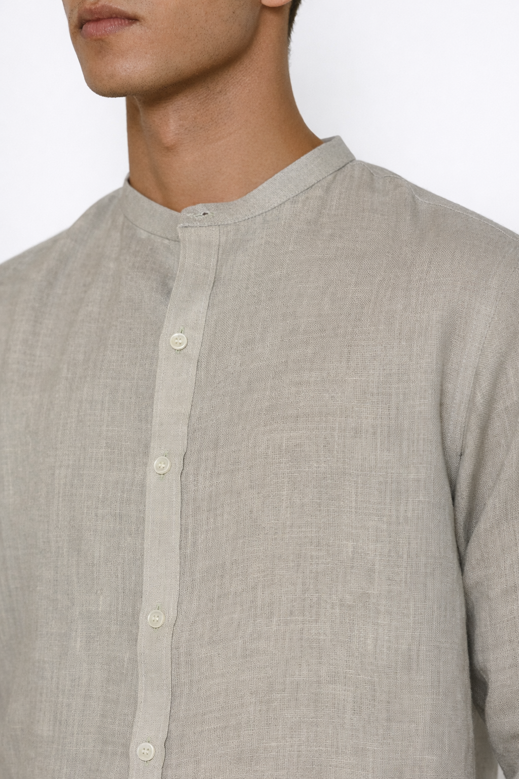 Close-up of ash grey linen fabric on co-ord set by LININ