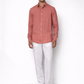 Model wearing burnt rose linen shirt for men from LININ