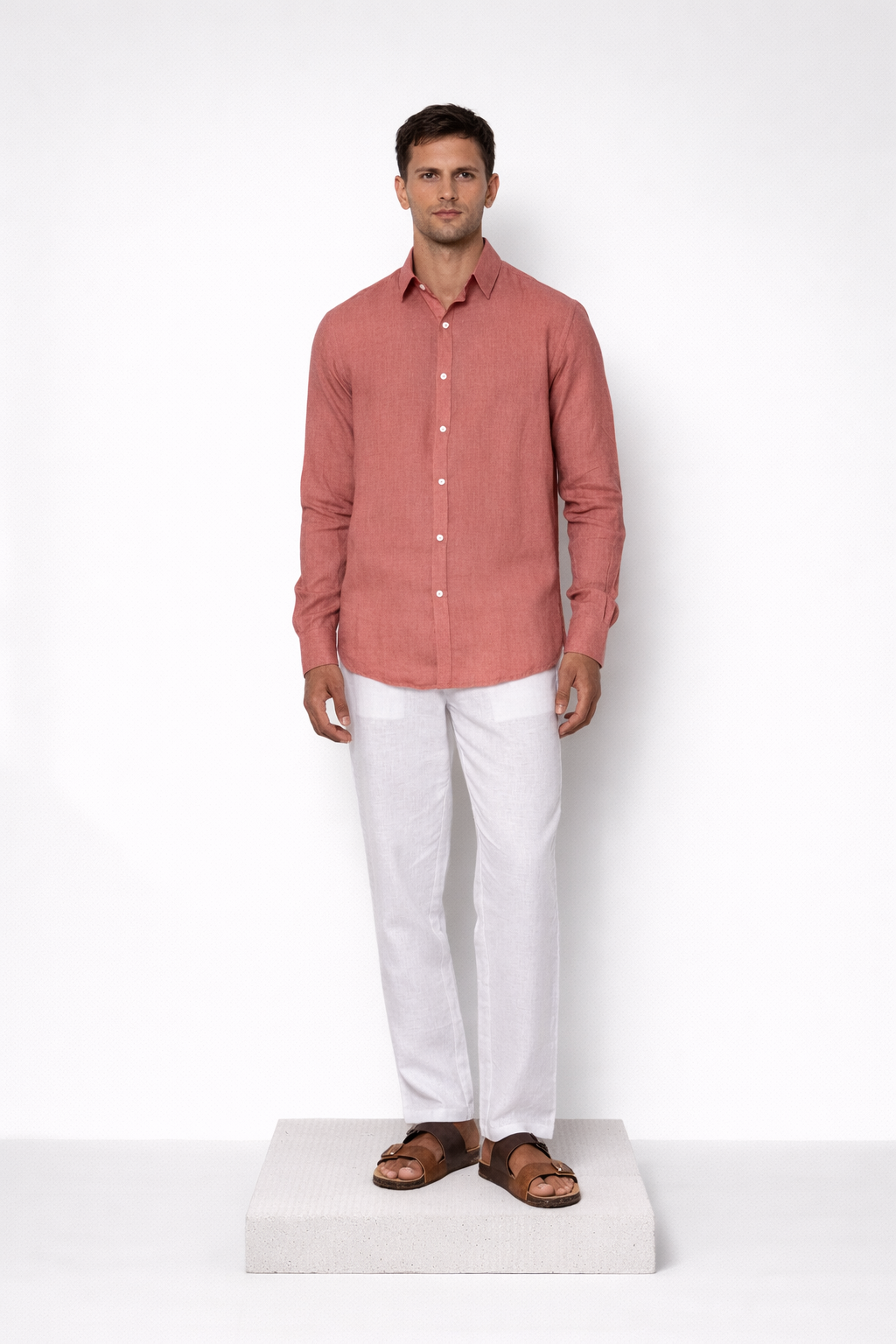 Model wearing burnt rose linen shirt for men from LININ