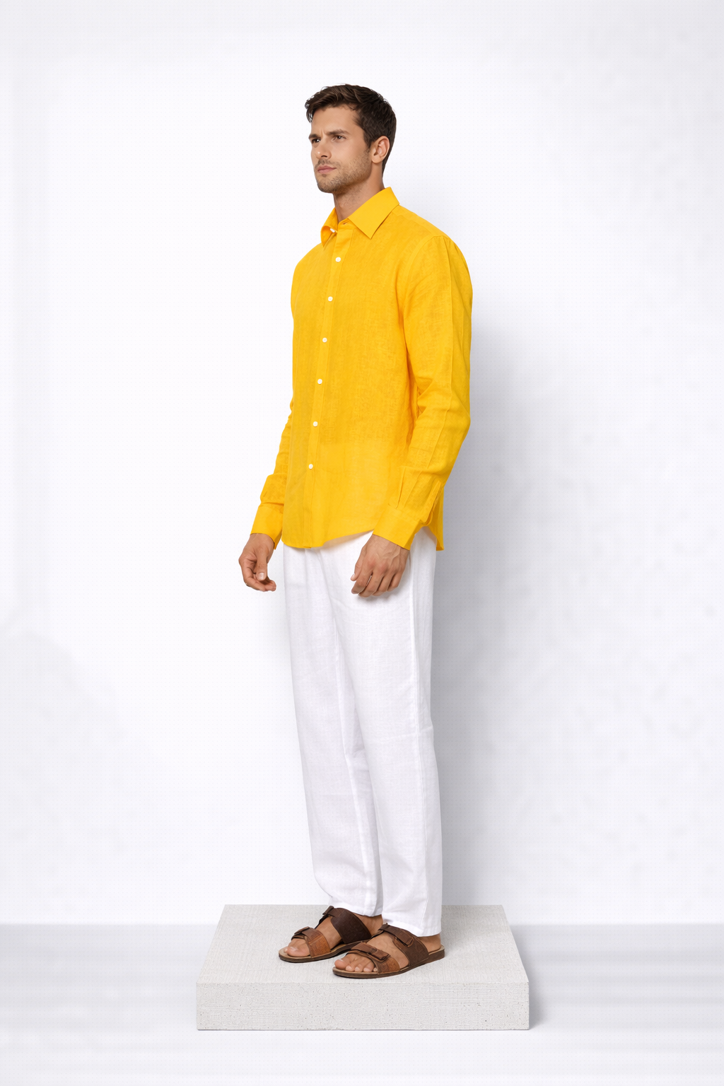 Model wearing mango yellow linen shirt for men from LININ