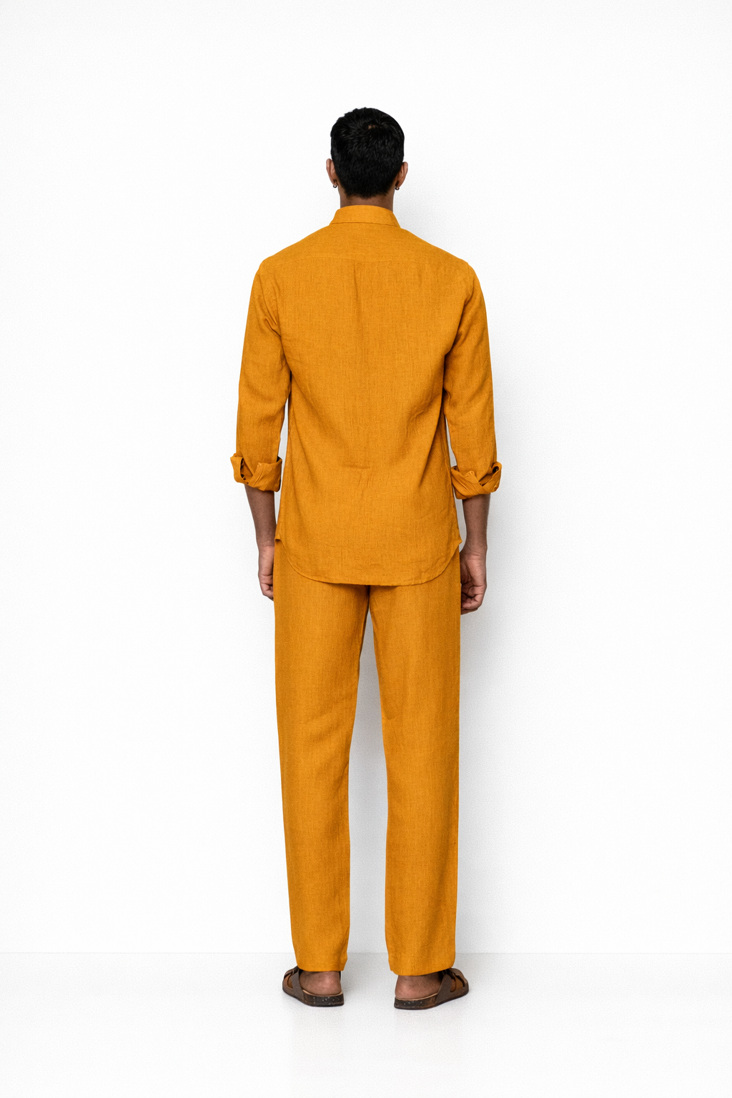 Back view of mustard men’s linen shirt by LININ