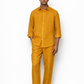 Model wearing mustard linen shirt for men from LININ