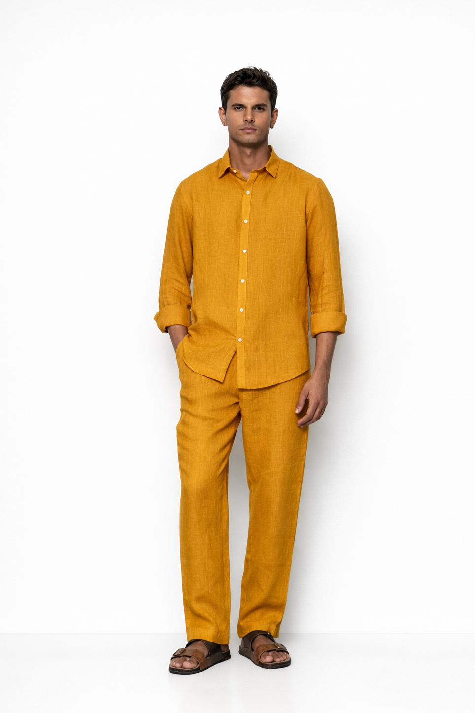 Model wearing mustard linen shirt for men from LININ