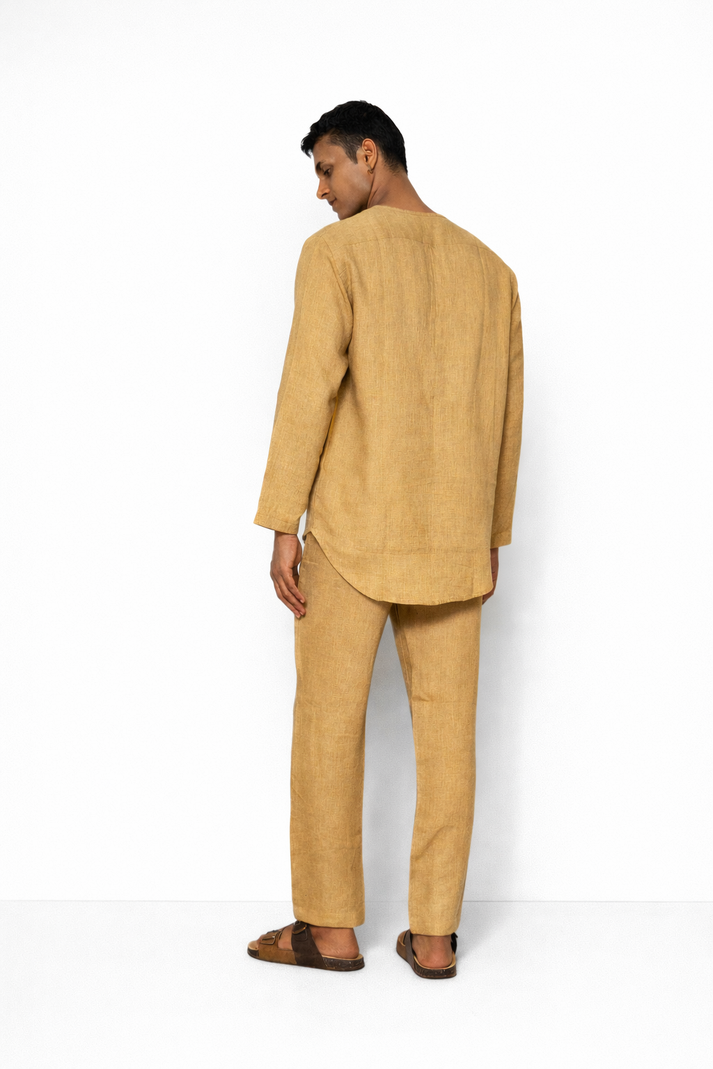 Back view of ochre linen men’s short kurta set by LININ
