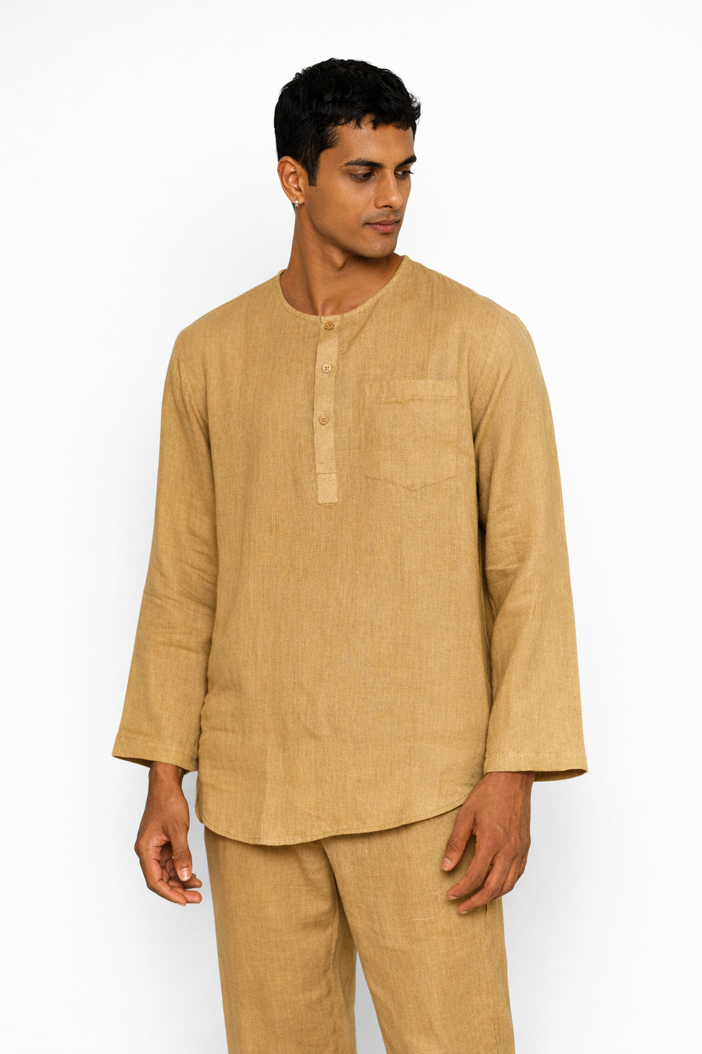 Close-up of ochre linen fabric texture on men’s short kurta set by LININ