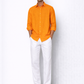 Model wearing orange linen shirt for men from LININ