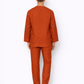 Back view of rust men’s linen pants by LININ
