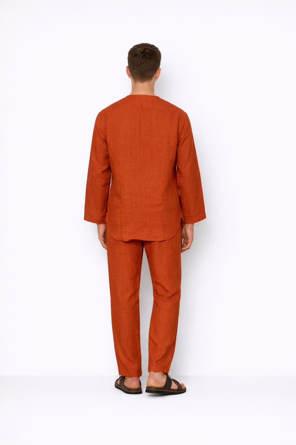 Back view of rust men’s linen pants by LININ