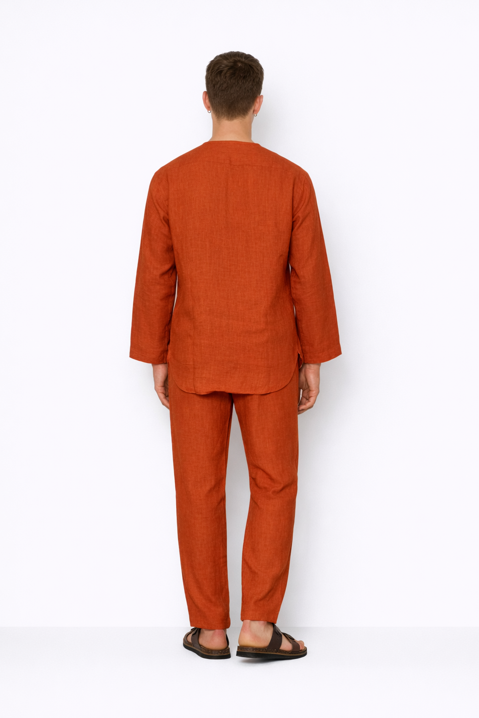 Back view of rust men’s linen short kurta set by LININ