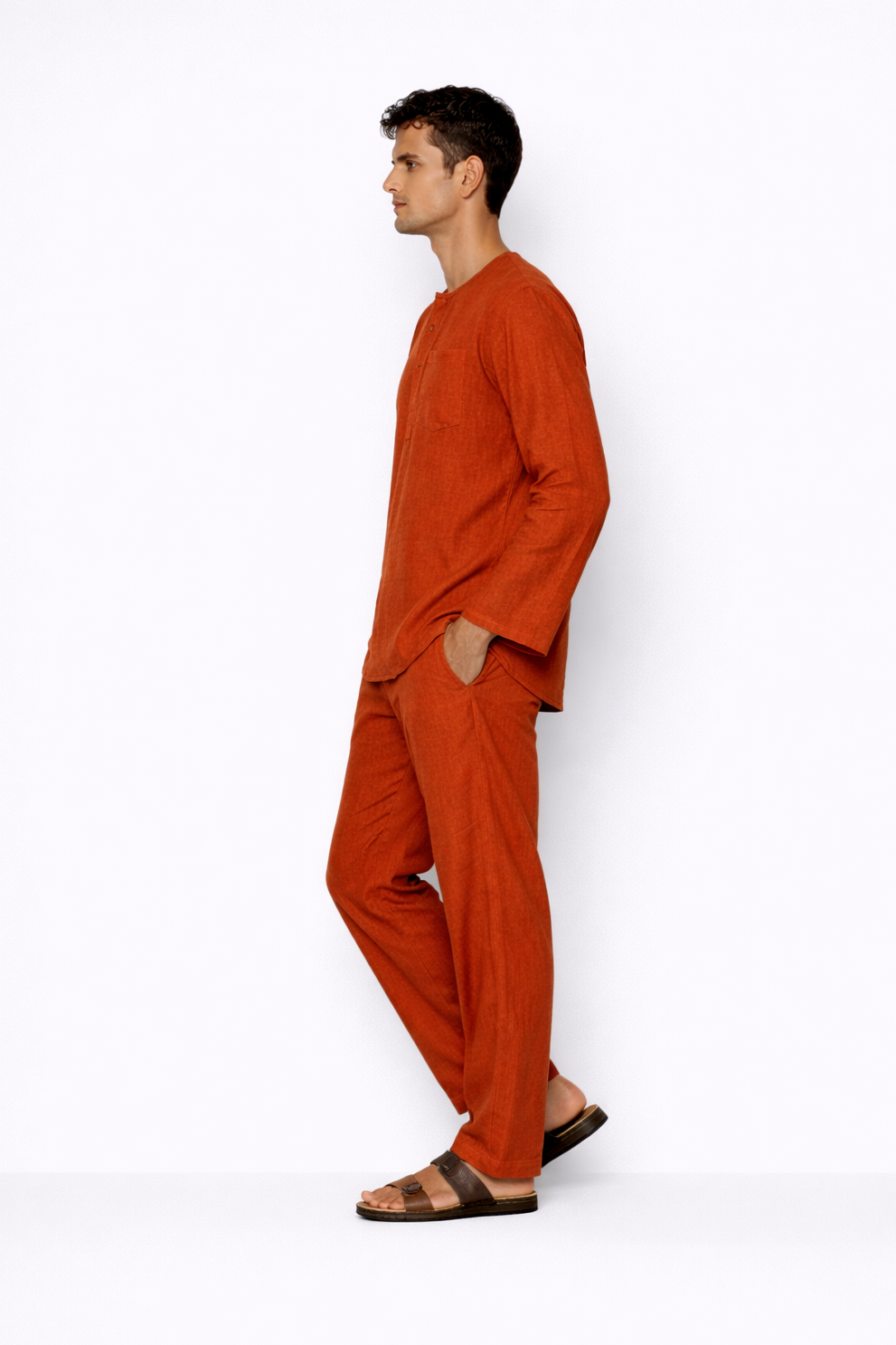 Side profile of rust linen short kurta set for men by LININ