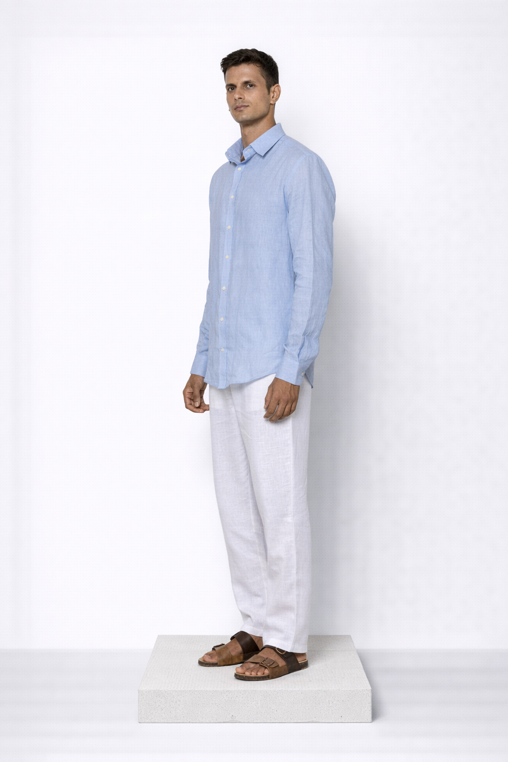 Side angle full shot of sky blue linen shirt for men by LININ