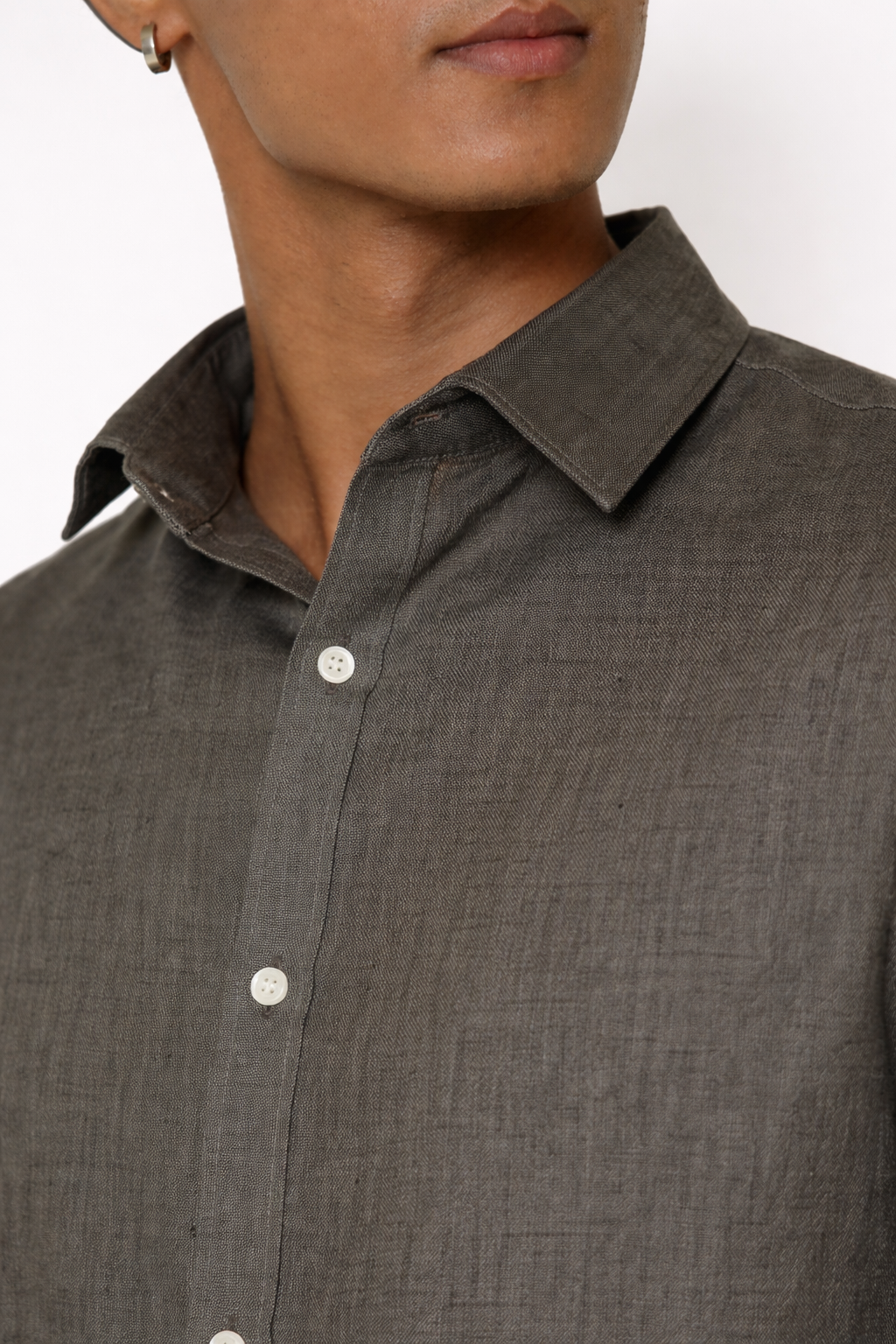 Close-up of steel grey linen fabric texture on men’s shirt by LININ