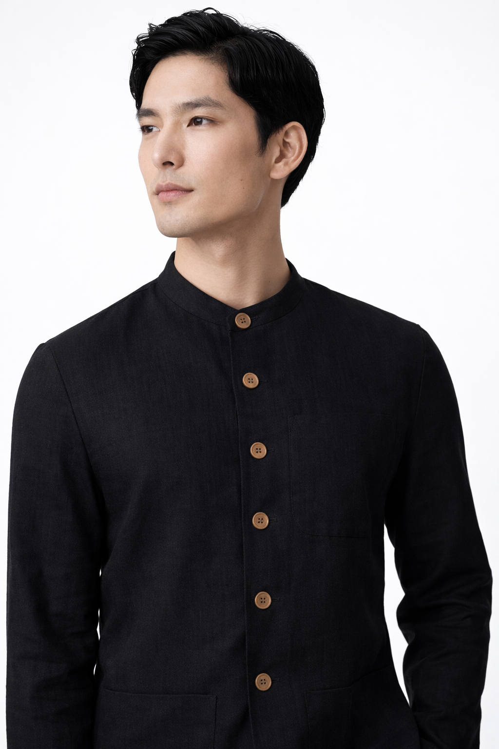Close-up of pure linen fabric texture in midnight black jacket