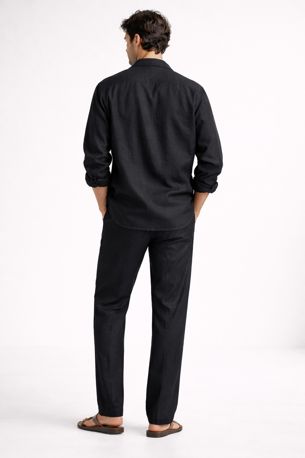 Back view of men’s midnight black pure linen overshirt set with relaxed silhouette