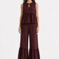 Woman wearing Mulberry Muse pure linen co-ord set in rich mulberry colour - front
