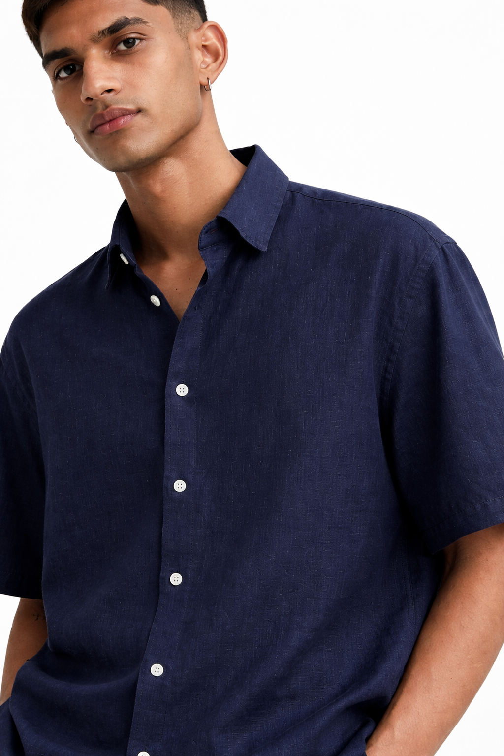 Close-up of navy blue linen fabric texture on men’s shirt