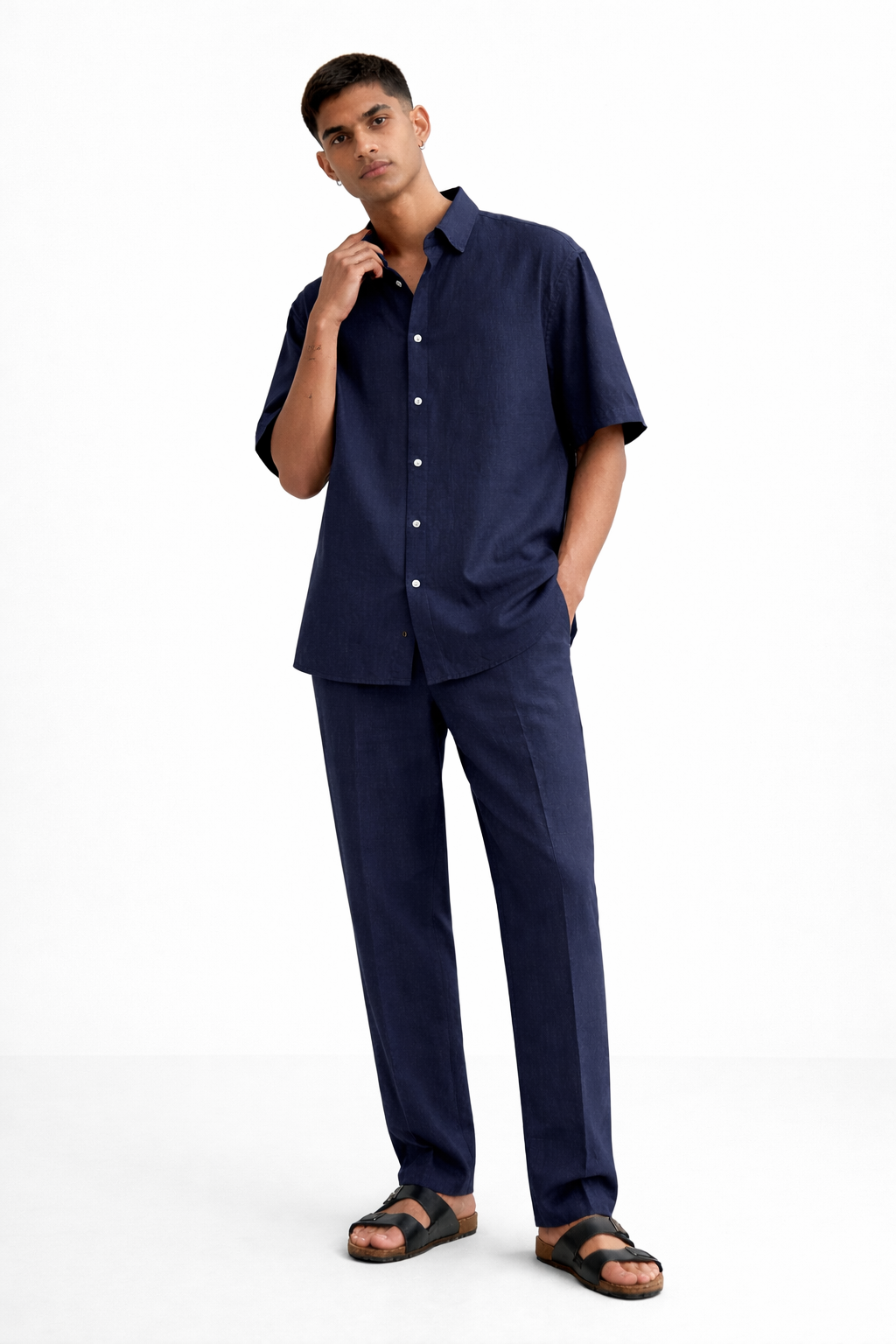 Men’s navy blue linen co-ord set shown at a 45-degree angle