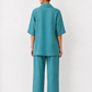 Nivara teal linen set for women back view