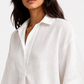 Noor Safa linen top close-up showing fabric texture and V neckline