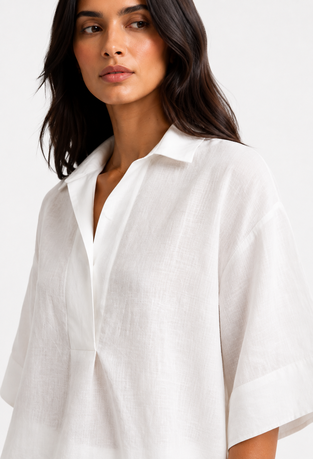 Noor Safa linen top close-up showing fabric texture and V neckline