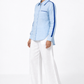Ocean blue women’s linen shirt with satin detailing 45-degree view