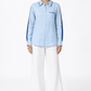 Ocean blue linen shirt with navy satin detailing styled with white linen trousers
