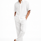 Men wearing pearl white linen shirt and pants set in relaxed standing pose