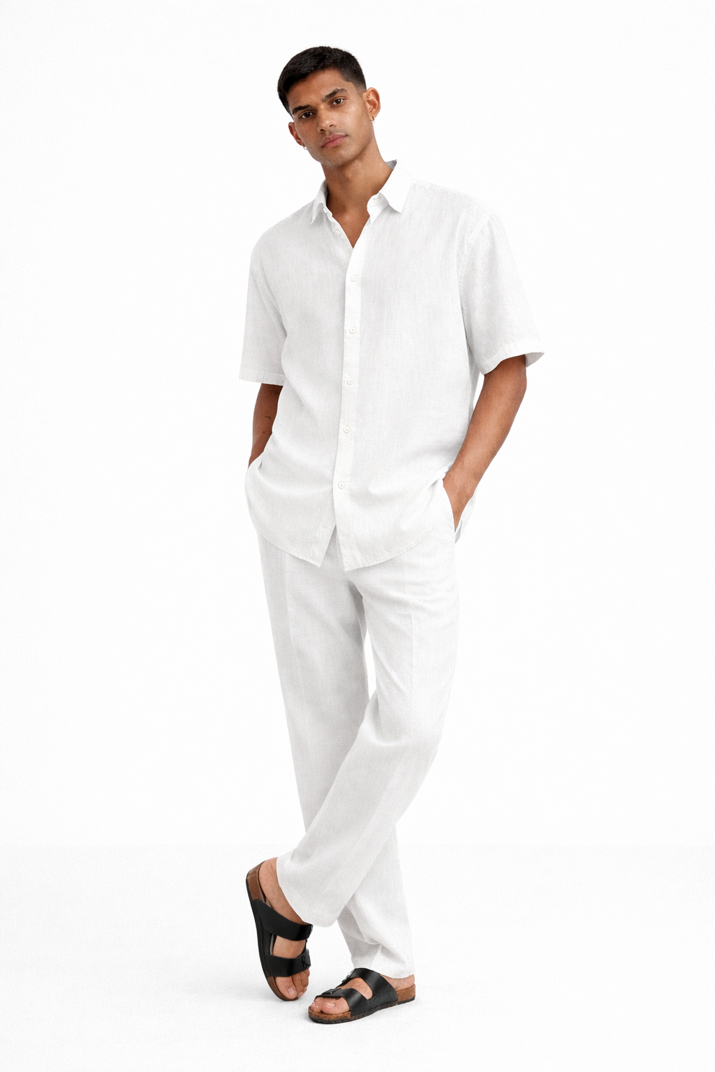 Men wearing pearl white linen shirt and pants set in relaxed standing pose