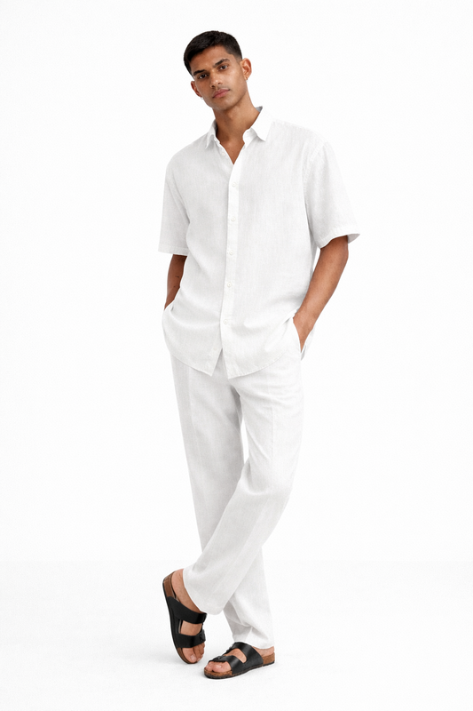 Men wearing pearl white linen shirt and pants set in relaxed standing pose