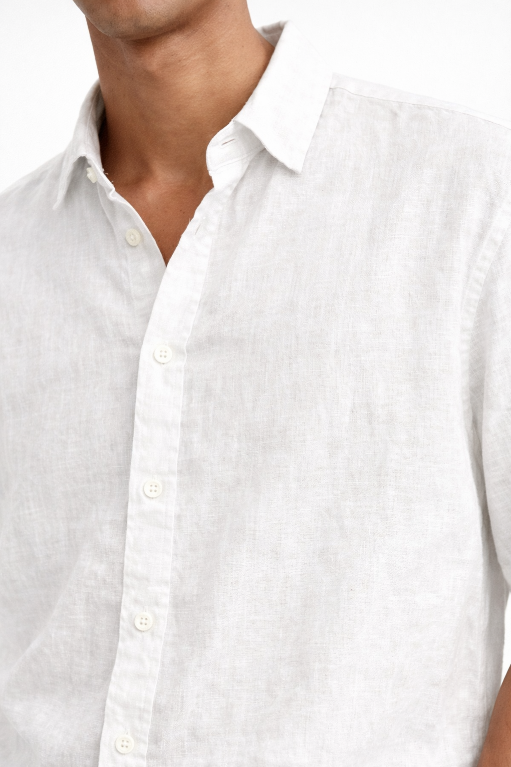 Close-up of premium pearl white linen fabric texture on men’s shirt