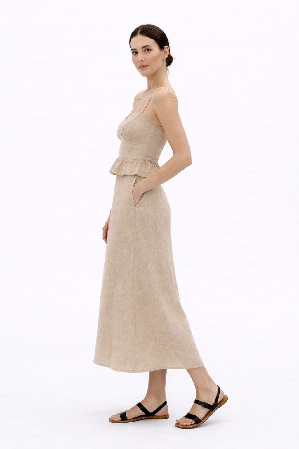 Side view of Raw Terra undyed linen peplum top and midi skirt set