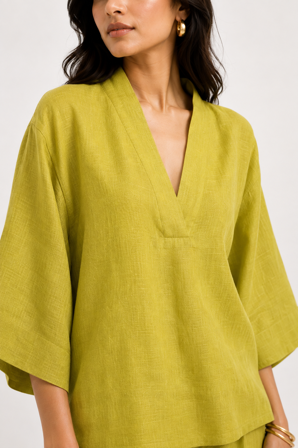 Riwaayat linen top with relaxed V-neck and wide sleeves