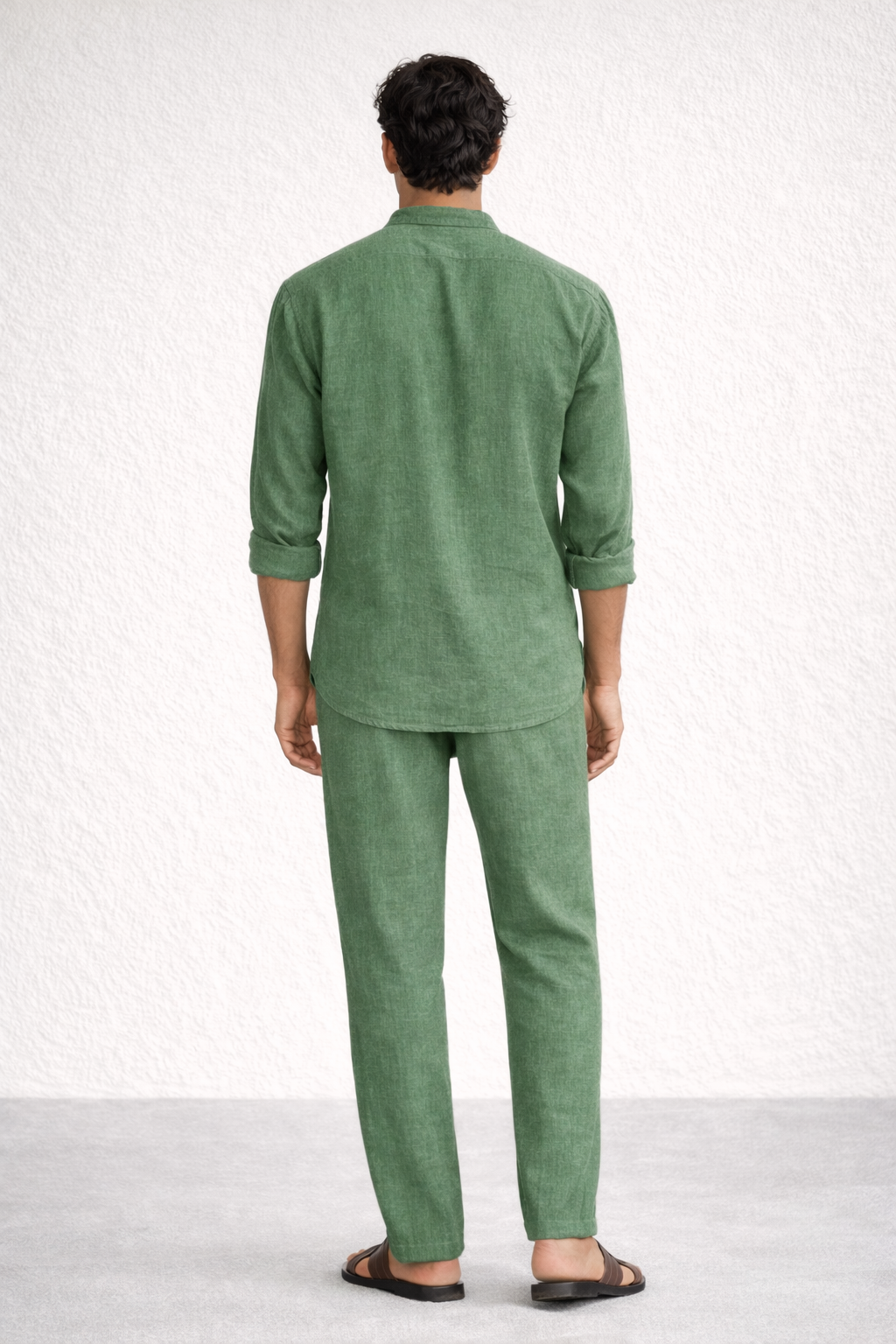 Back view of sage green linen kurta set for men