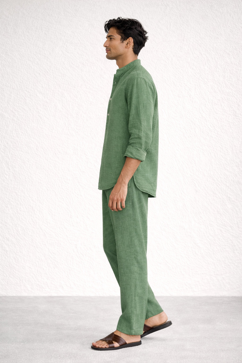 Side view of sage green linen short kurta set for men