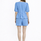 Back view of Santorini Sky Linen Set showing relaxed fit