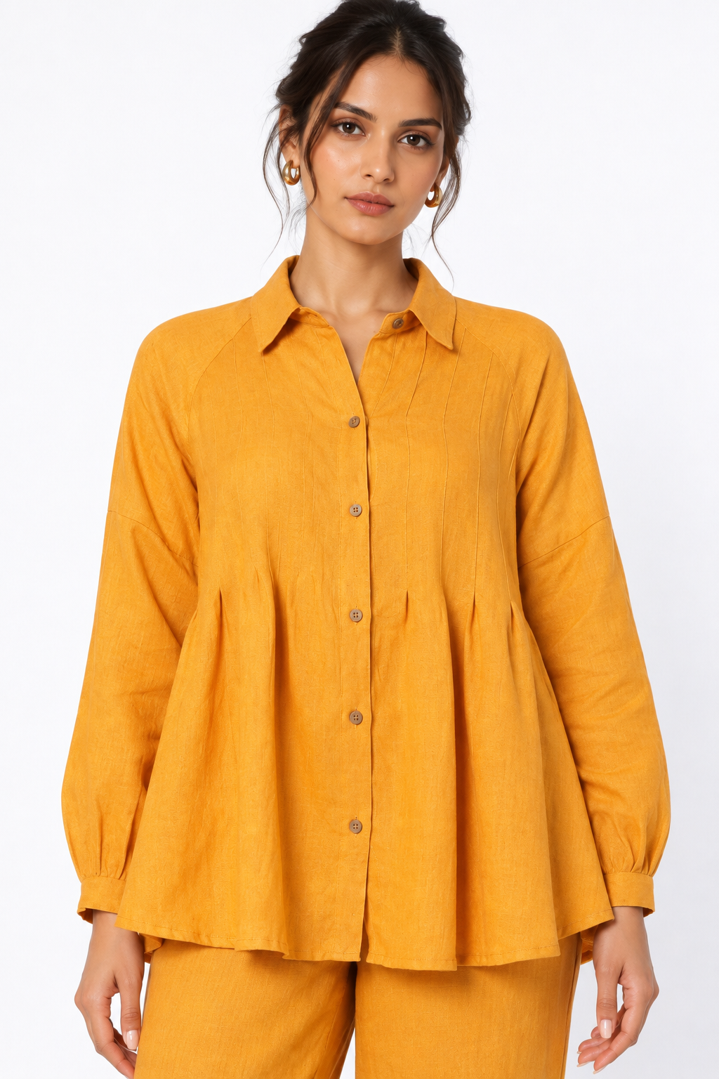 Close-up of Sarson women's mustard linen shirt with collar, buttons and pintuck details