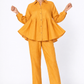 Sarson mustard linen shirt set for women showing flared shirt silhouette